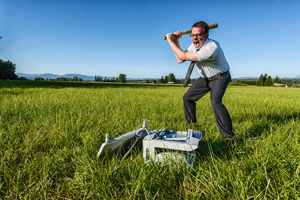 It seems the classic printer-smashing scene from “Office Space” is popular enough to be emulated in the world of stock photos, such as this one.